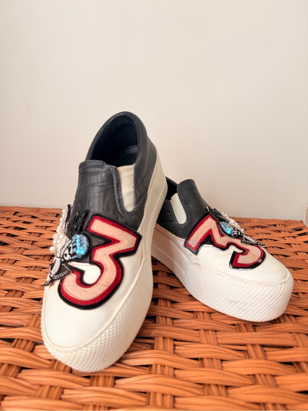 Miu Miu White and Black Slip-On Platform Sneakers with Red Patch